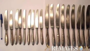 18 cuchillos Berndorf (Oso) 9 de mesa y 9 de postre. Mangos con abolladuras