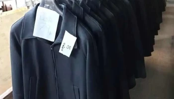 54 Camperas negras de paño de lana talles S y M