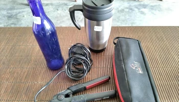 botella azul vaso con  tapa y plancha de pelo Gama