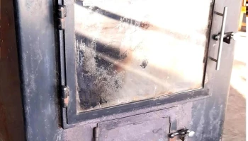 Calefactor a leña, con puerta de vidrio todo en muy buen estado