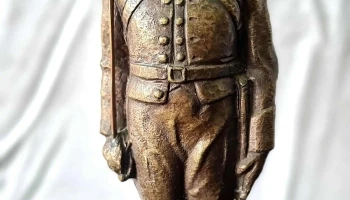 Estatuilla bronce macizo blandengue