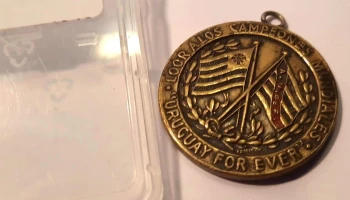 Medalla Campeones Olímpicos 1924 con dedicatoria del Pte. Serrato