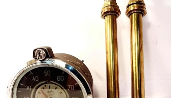 Reloj de auto y par bombas cocina volcán bronce