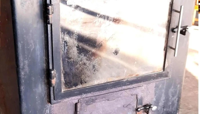 Calefactor a leña, con puerta de vidrio todo en muy buen estado