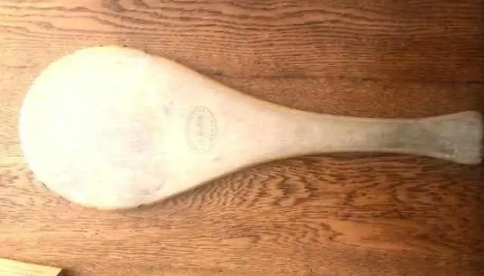 paleta en madera usada con tarugos de metal