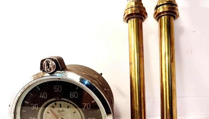 Reloj de auto y par bombas cocina volcán bronce